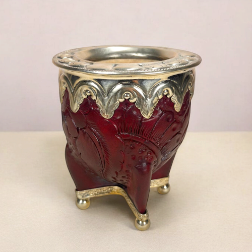 an imperial maté calabash. Engraved leather and hand-cut alpaca virola.