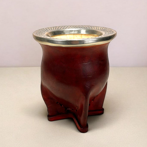 a maté calabash handmade by a craftsman. Calabash from Brazil, cowhide and alpaca virola