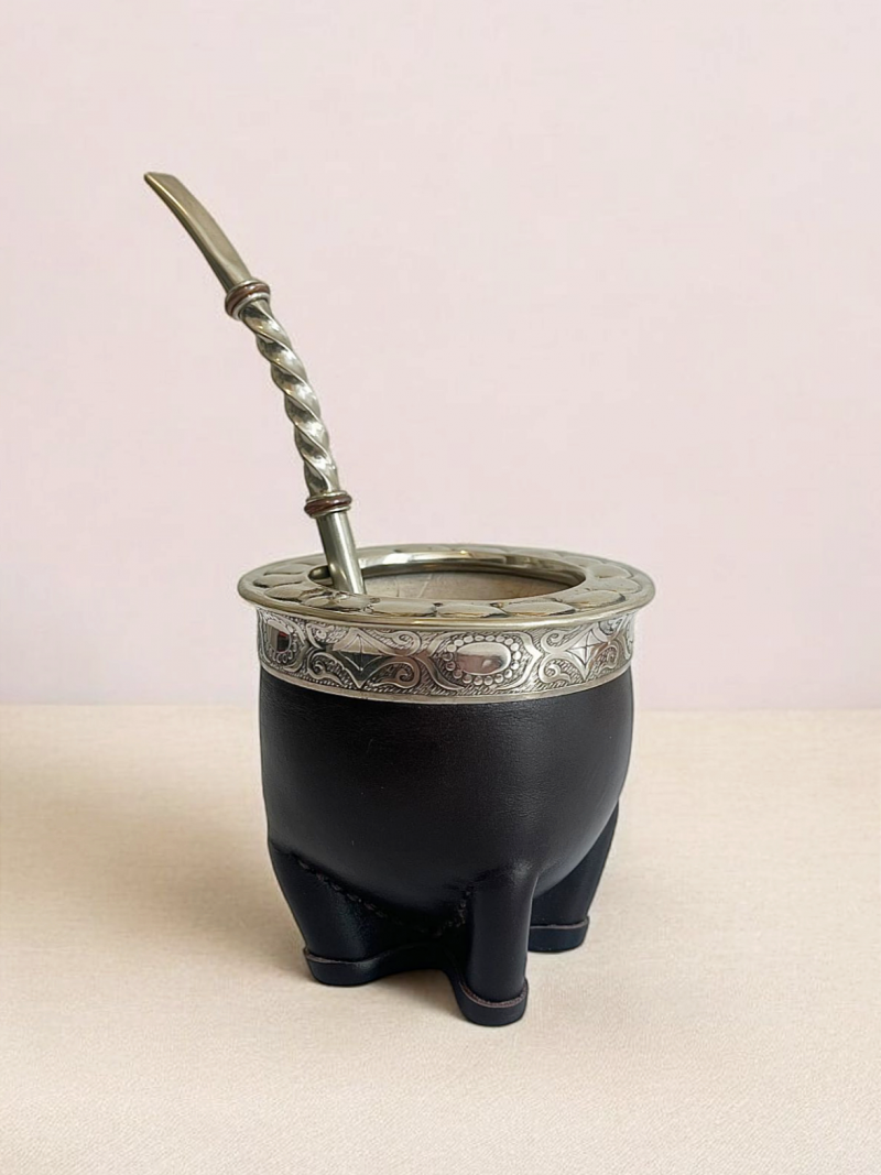 Artisanal maté calabash from Argentina. Double brown leather and alpaca model accompanied by its bronze and alpaca bombilla.
