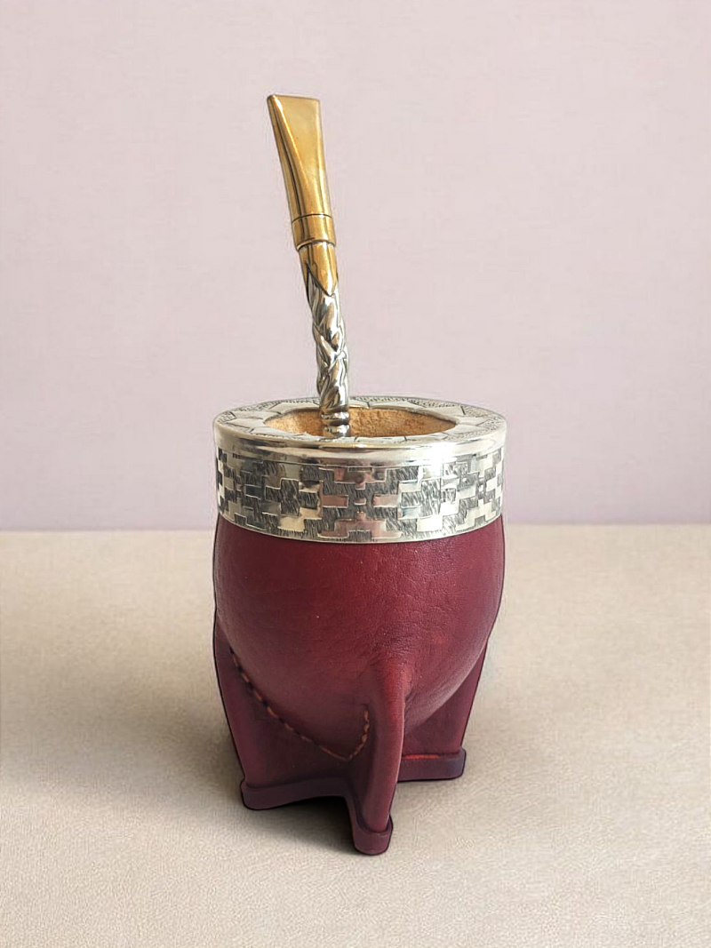A premium imperial maté calabash with a brown leather-covered alpaca virola and alpaca bombilla.